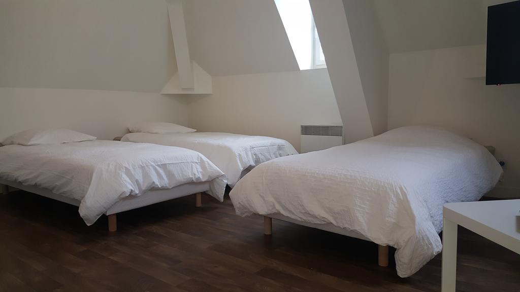 Au Pigeon Blanc Hotell Andouillé Exteriör bild