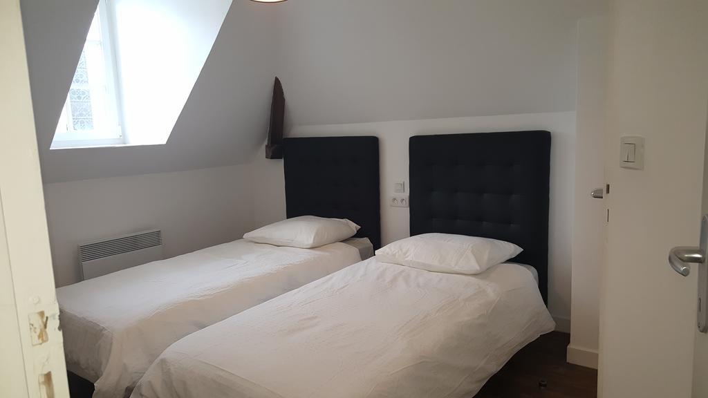 Au Pigeon Blanc Hotell Andouillé Exteriör bild