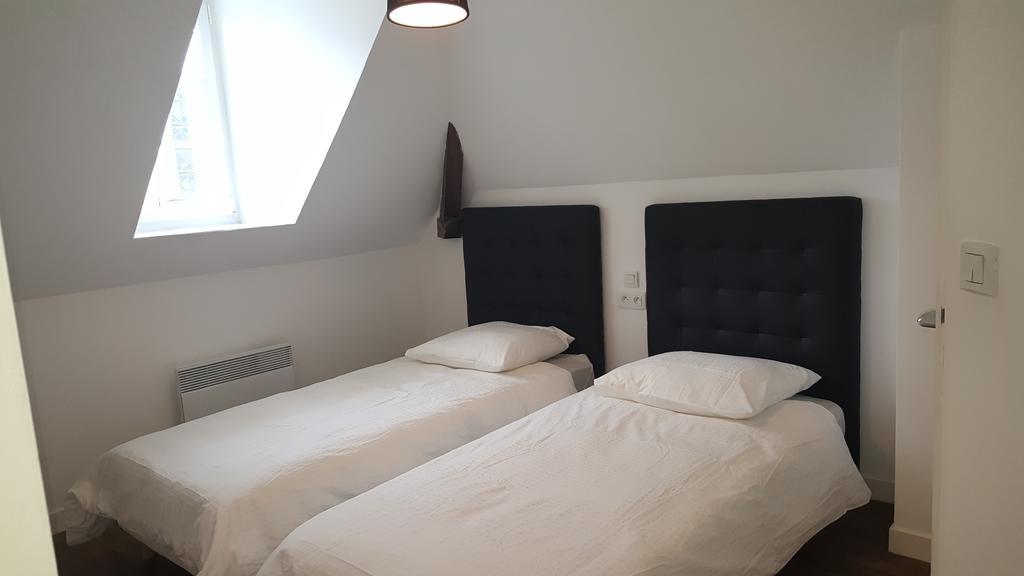 Au Pigeon Blanc Hotell Andouillé Exteriör bild
