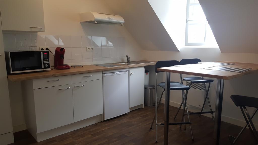 Au Pigeon Blanc Hotell Andouillé Exteriör bild