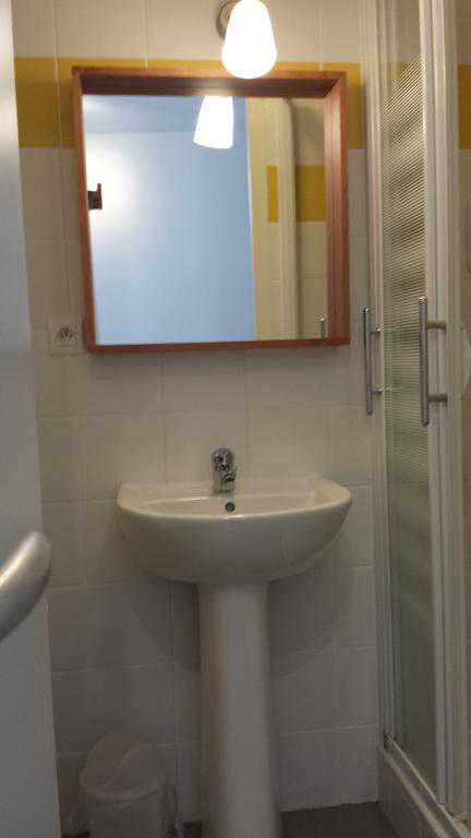 Au Pigeon Blanc Hotell Andouillé Rum bild