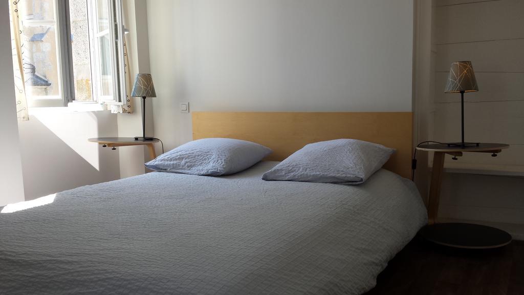 Au Pigeon Blanc Hotell Andouillé Rum bild